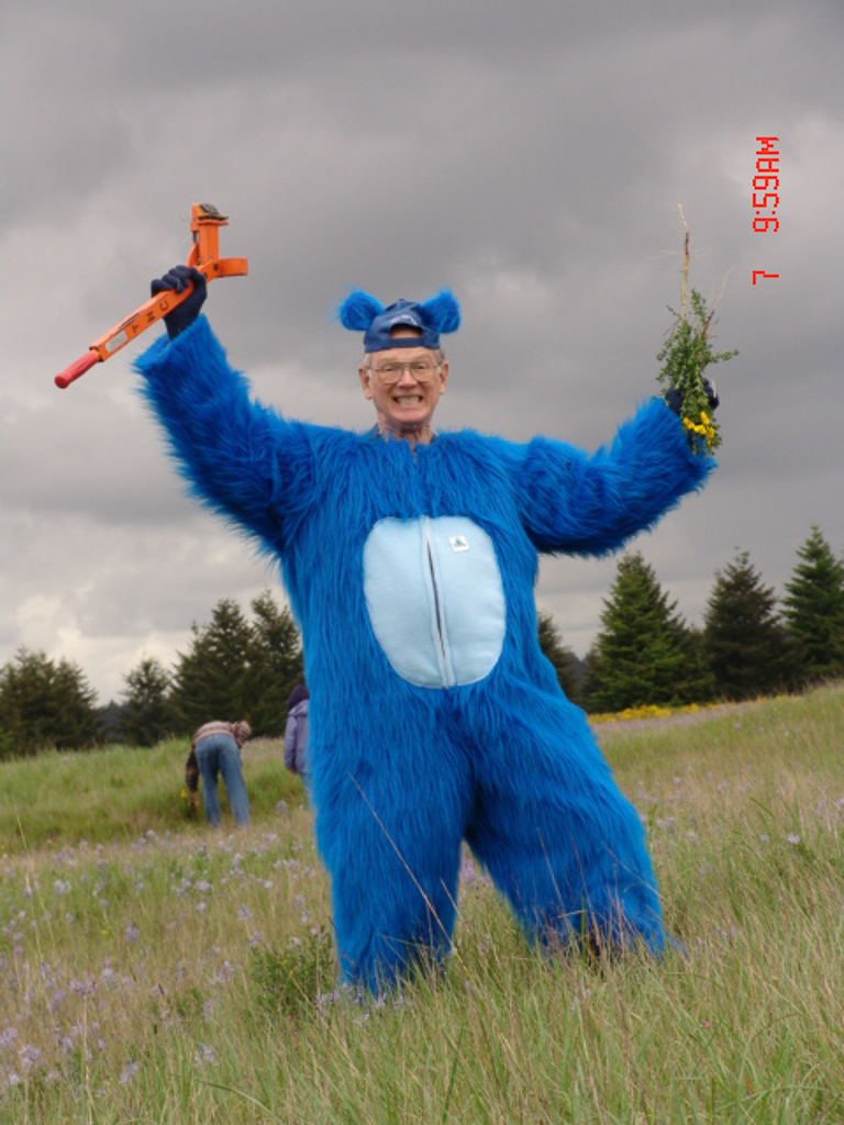Cliff Snyder, who always loves a good story, used to tell people the mounds were made by prehistoric Blue Gophers.  I jokingly suggested we make him dress up like one for PAD.  Marion Jarisch tooke me seriously and made him the suit and he wore it every PAD for years.  Photo by Margaret Allen